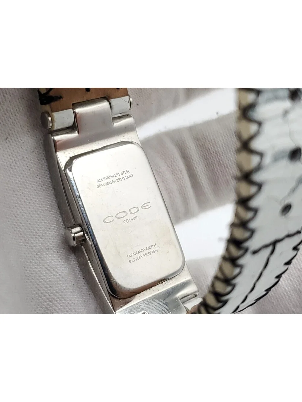 Code Quartz Womens Watch New Battery Siver Tone White Dial Rectangle 17mm